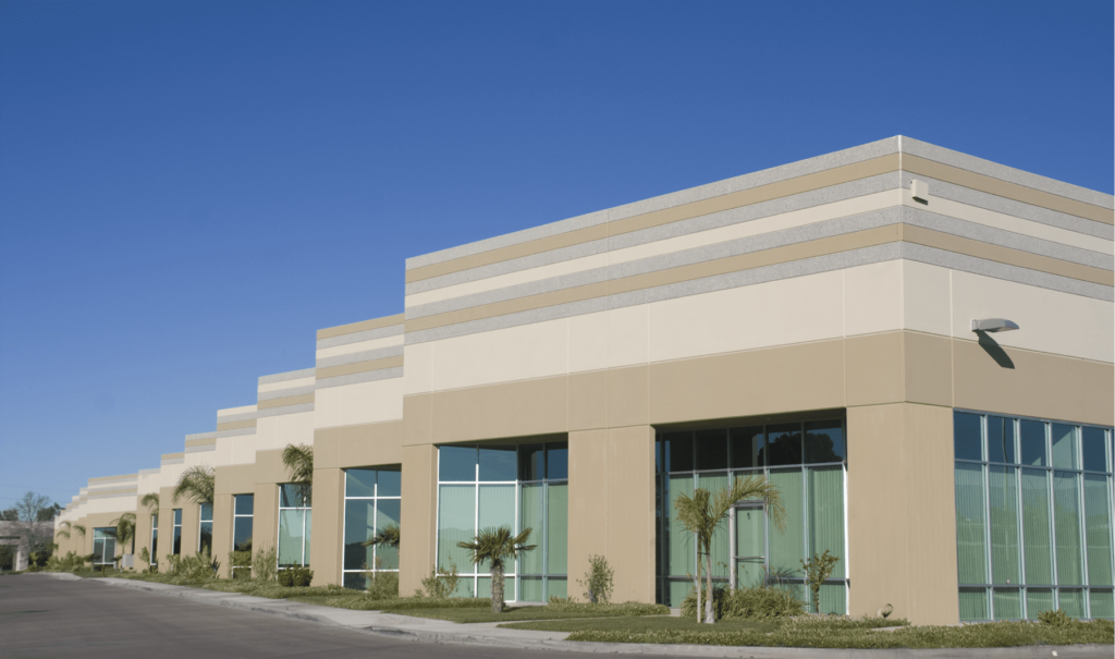 image of office buildings on sunny day with blue skies