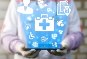 a doctor holds holographic icons representing practice management software vs electronic medical records management software differences