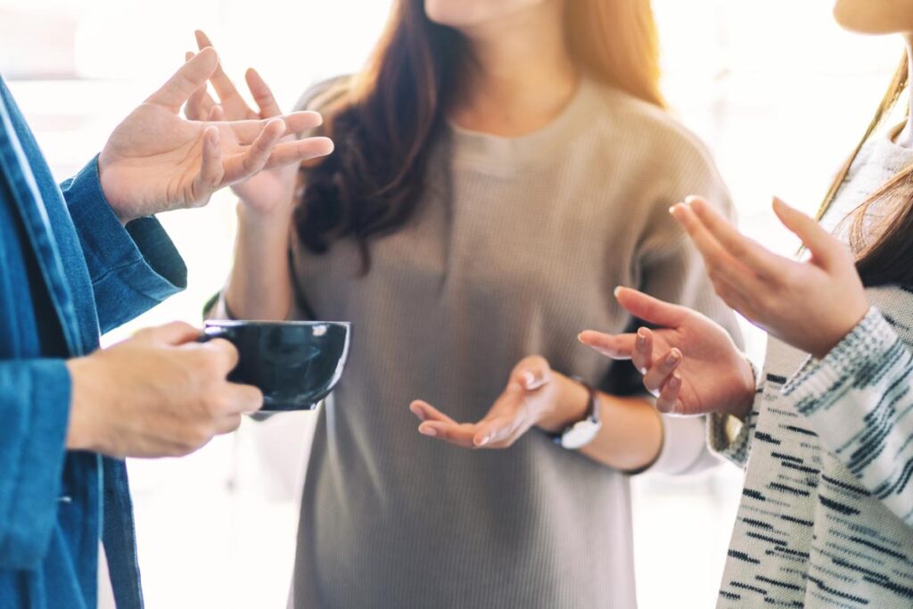 a group discusses the answer to "what is community-integrated care?