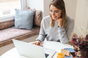 Building Lasting Connections with Addiction Treatment Alumni a woman researches how to improve addiction treatment alumni engagement
