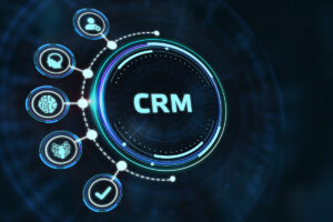 a digital image that reads "CRM" with connected icons