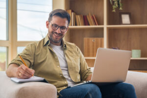 Man on couch with laptop